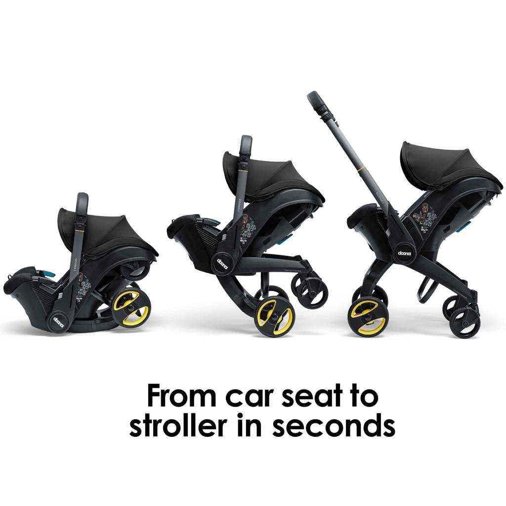 Doona Infant Car Seat & Stroller - Nitro Black - Infant - Rear-Facing 4-35 lbs - Integrated Wheels - Adjustable Handlebar image 1